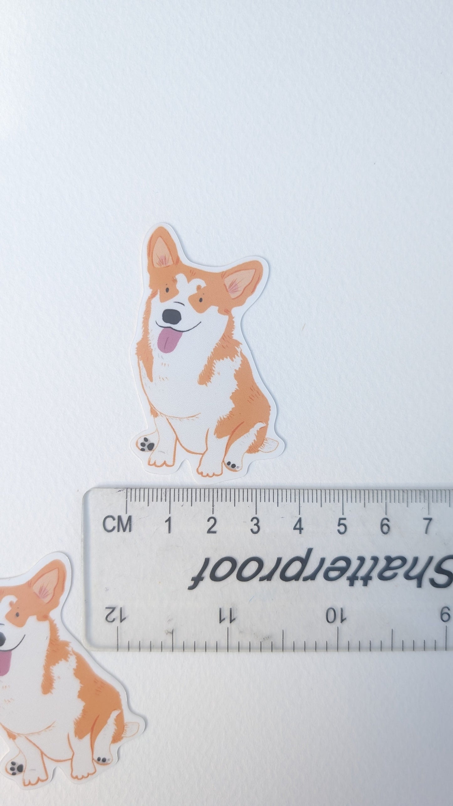 Corgi dog illustrated die cut sticker. Vinyl waterproof sticker for laptops, notebooks, water bottles